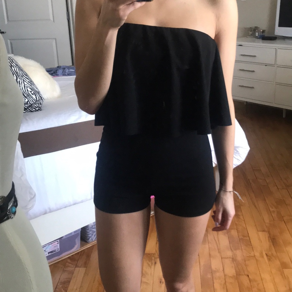 Akira black ruffle front strapless fitted romper